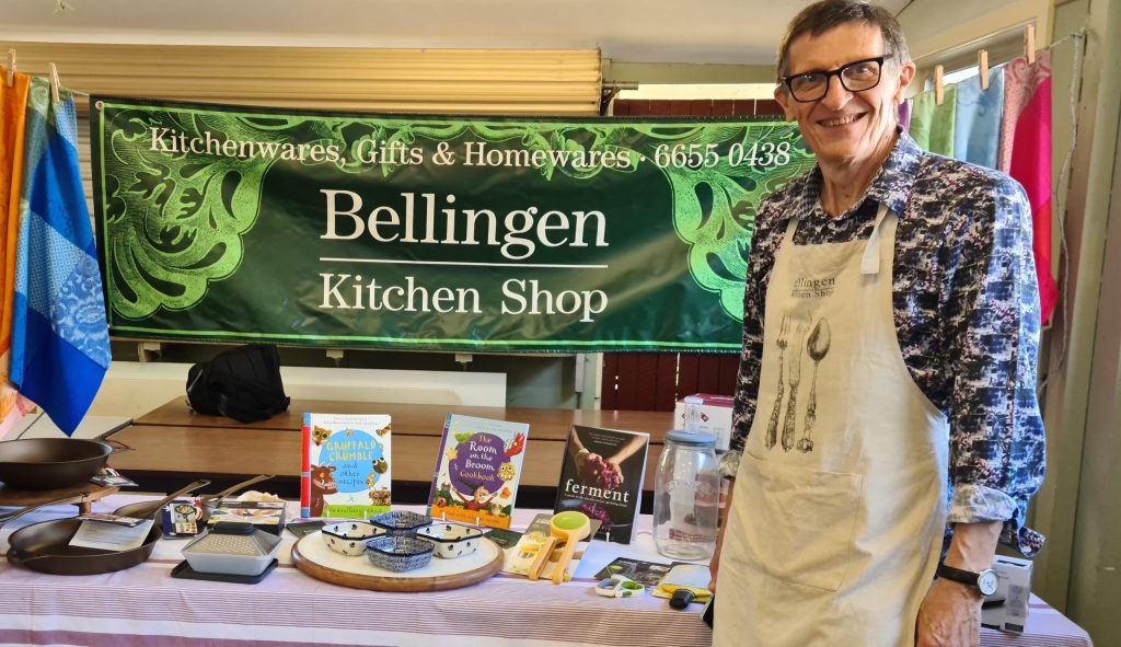 Bellingen Kitchen Shop owner Jamie with display of kitchen items for sale